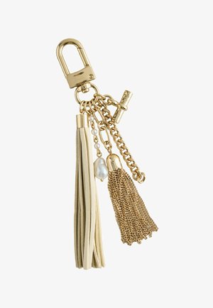Gold keychain with cream leather tassel, gold chain tassel, faux pearls, and a toggle clasp.