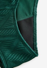 Traje de baño - dark green textured