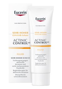 Eucerin Actinic Control MD Fluid, weiße Tube mit Flip-Top-Verschluss, zeigt orange und schwarzen Text auf der Verpackung, der hohen Sonnenschutz betont.