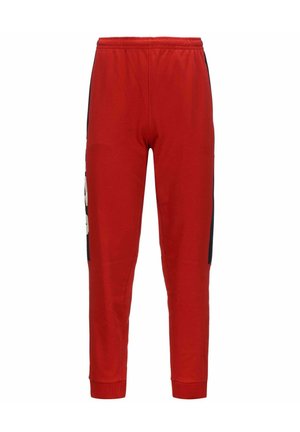 Pantalon de jogging rouge avec taille élastique, jambes fuselées et panneaux latéraux noirs avec accents de texte blancs.