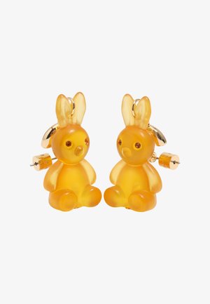 Paari läbipaistvat merevaigukollast jänku-kujulist kõrvarõngast kuldse tooniga metalltagustega ja oranžide vääriskivisilmadega.