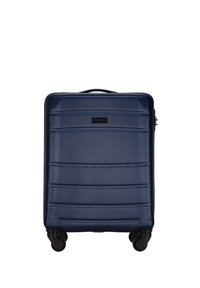 Navy blue hardshell suitcase with textured surface, flexibly spinning wheels, and a top handle; features a central zip closure and logo detail.