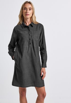 Charcoal gray linen dress with a collared neckline, button front, two chest pockets, and long sleeves. Straight cut with side pockets.
