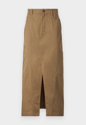 Khaki maxi skirt made of cotton-blend fabric, featuring a front slit, side pockets, and a button closure at the waist. Smooth texture.