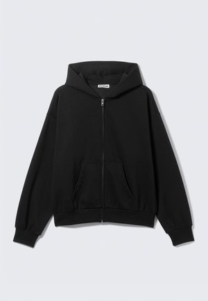 Black zip-up hoodie with a kangaroo pocket, wide sleeves, and a drawstring hood, made from a soft textured fabric.