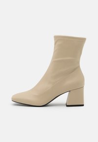 Botas clássicas de cano curto - beige
