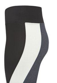 High-waisted leggings featuring a black waist, white and grey panels, elastic fabric, and stitched seams for a form-fitting design.