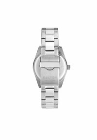 Orologio da polso in metallo argento con bracciale in acciaio inossidabile, cassa rotonda e fondo testurizzato. Presenta un marchio inciso sulla chiusura.