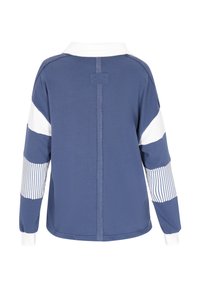 Camicia a maniche lunghe con colletto di colore blu navy con righe bianche. Caratterizzata da tessuto a righe sulle maniche e un dettaglio di cucitura centrale. Materiale in misto cotone.