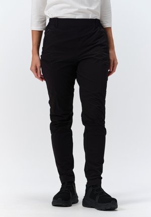 Pantaloni neri elasticizzati con un taglio slim, dotati di tasche laterali con zip e cintura elastica, realizzati in un tessuto leggero e testurizzato.