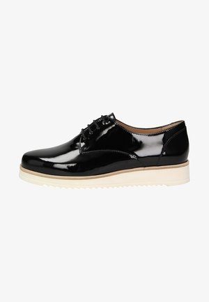 Chaussures noires en cuir laqué à lacets avec une finition brillante, dotées d'une semelle en caoutchouc blanc et de détails de couture subtils.