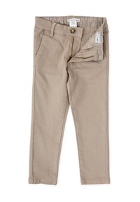 Pantalones de algodón beige con una textura suave, que cuentan con una cremallera, cierre de botón y una cinturilla elástica para mayor comodidad.
