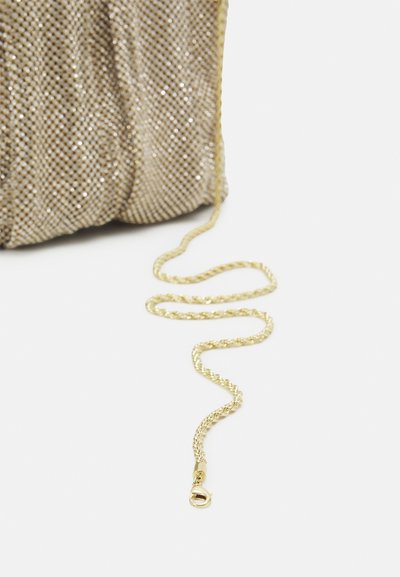 Metallic gold mesh handbag with a textured, wavy design. Features a braided gold chain strap and a clasp for secure closure.