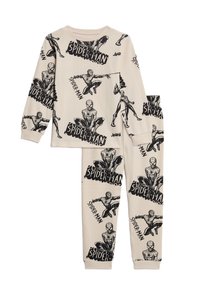 Ensemble de pyjama Spider-Man en crème, avec des illustrations graphiques noires de Spider-Man. Manches longues et taille élastique pour un confort optimal.
