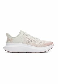 Beige athletic shoes with a textured mesh upper, pink gradient design, thick white midsole, and dark rubber outsole.