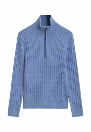 Light blue sweater with a high collar, quarter zip, and textured cable knit pattern. Includes a small embroidered logo on the chest.