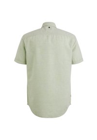 Korte mouwen shirt in lichtgroen, gemaakt van een gestructureerde stof. Heeft een ronde zoom en een achterpand met een klein accentdetail bij de kraag.