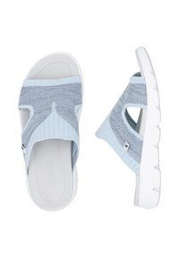 Light blue sandals with a knitted upper and adjustable cross straps, featuring a white cushioned sole and textured footbed.