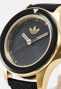 adidas Originals EXPRESSION ONE - Hodinky - black/gold-coloured-coloured tone