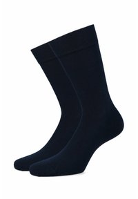 Granatowe skarpetki wykonane z miękkiego, elastycznego materiału. Posiadają żebrowany mankiet na górze oraz bezszwowy design palców dla wygody.