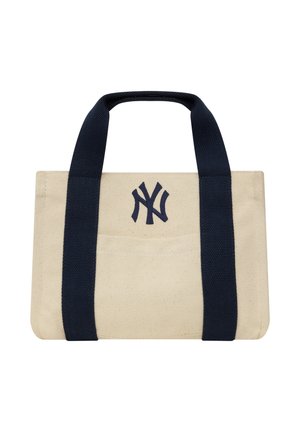 Kleine beige katoenen draagtas met brede zwarte handvatten en een zwart New York Yankees-logo op het voorvak.