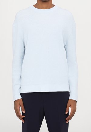 Stickad tröja - light blue