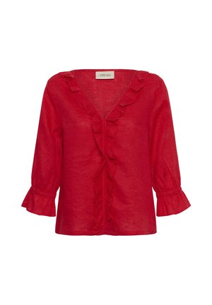 Rød bluse med flæse-V-halsudskæring og ærmer, der ender i flæsekantede manchetter, letvægtsstof, mærke "Cream" inde i kraven.