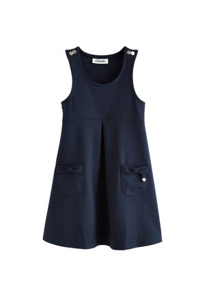 Navy blue sleeveless A-line dress with front pleat, two pockets with bows, button details on straps, and a small heart charm on right pocket.