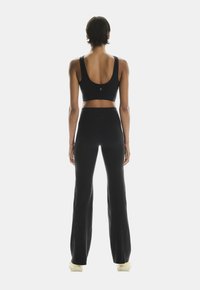 On STUDIO  - Leggings - black