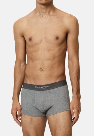 Boxers en coton gris avec une ceinture élastique gris foncé comportant le logo "Marc O'Polo" à l'avant, design ajusté.