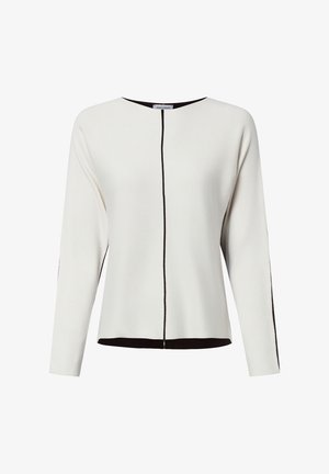White long-sleeve top with a round neckline, featuring a black center seam and black hem accents. Soft texture and relaxed fit.