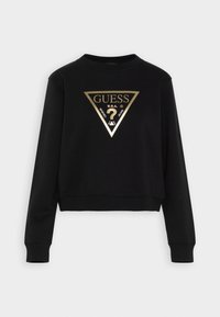 Sudadera corta negra de manga larga, con un diseño de logo triangular dorado centrado en el pecho. Tela suave con puños acanalados.