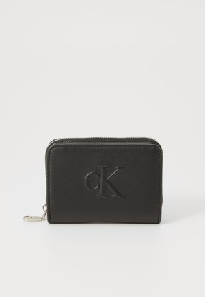 SCULPTED MED FLAP ZIP AROUND - Wallet - black