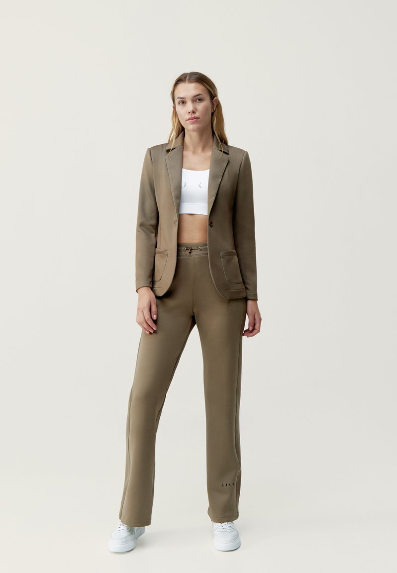 Born Living Yoga Pantaloni grigio talpa