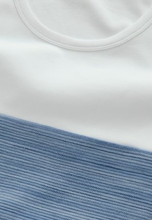 Cotton t-shirt with a round neckline, featuring a horizontal split design: white upper portion and textured light blue lower portion.