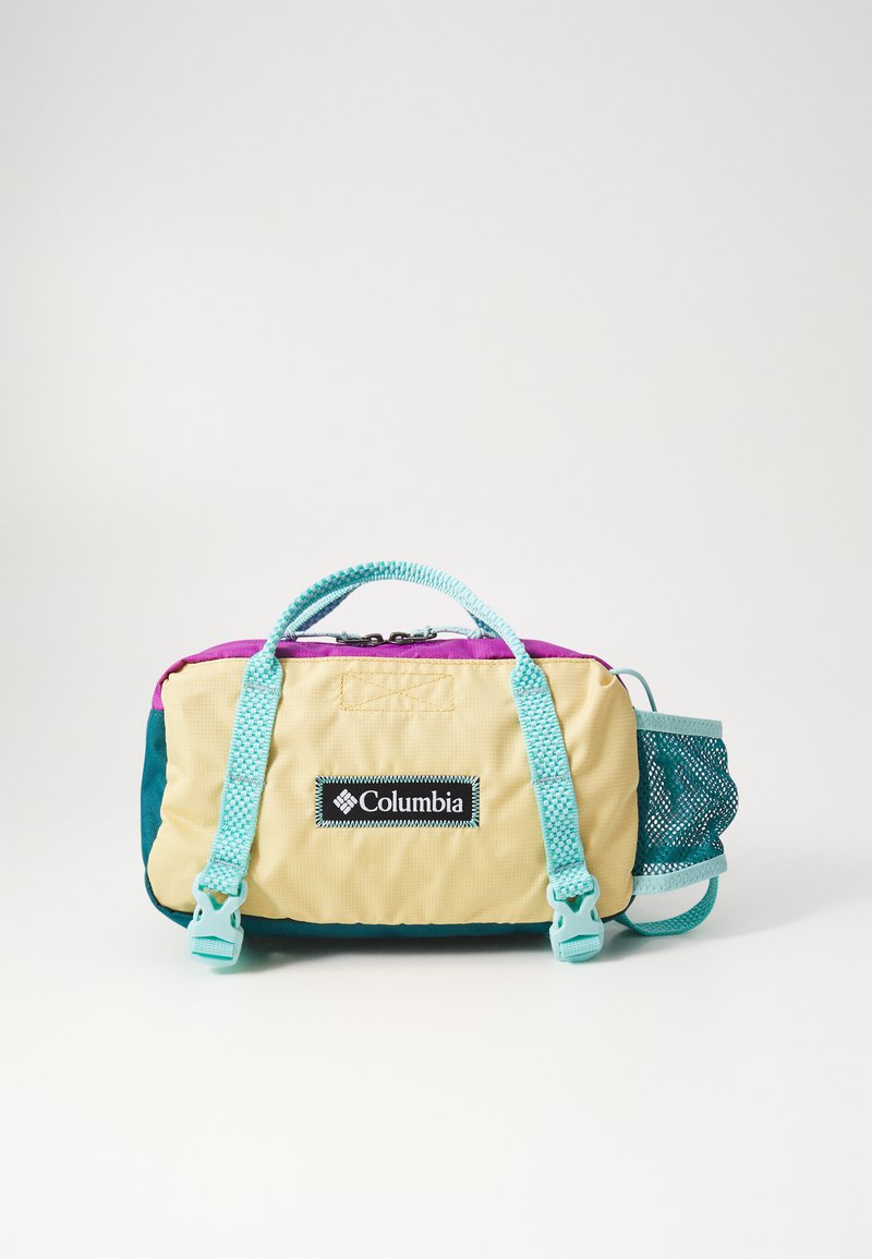 Saco multicolor da Columbia com corpo amarelo, detalhes em verde-água, parte superior rosa, alças texturizadas e um bolso lateral em rede. Fecho em zíper.