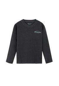 Camiseta negra de manga larga hecha de algodón. Presenta un logo circular en color teal claro en el lado izquierdo del pecho. Cuello redondo y ajuste holgado.