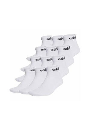 Weißer Knöchelsocken in einer Packung mit zehn Paar, mit schwarzem "adidas"-Logo am Saum, aus einem glatten Baumwollmischmaterial gefertigt.