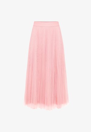 Jupe plissée rose longueur cheville avec une large ceinture, réalisée en tissu léger et transparent superposé à une doublure opaque.