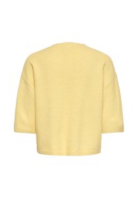 Pull en maille jaune à manches courtes avec un col rond et une coupe ample et carrée, montré de dos sur fond blanc.