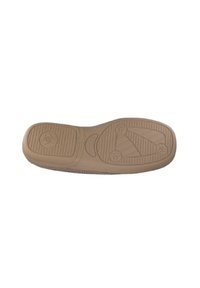 Suela de zapato de goma beige con superficie texturizada; presenta un patrón de surcos y acentos circulares para agarre y tracción.
