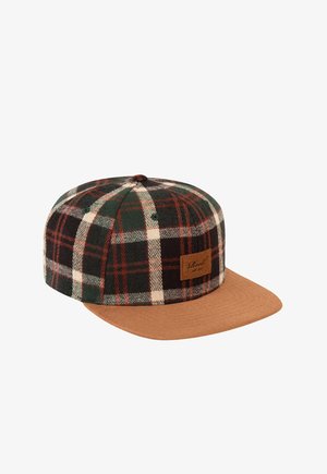 Plaid snapback cap with green, black, white, and red pattern, featuring a tan flat brim and a small brown rectangular logo patch on the front.