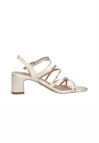 Beige strappy sandal with block heel, open toe, and ankle strap with side buckle, on white background.