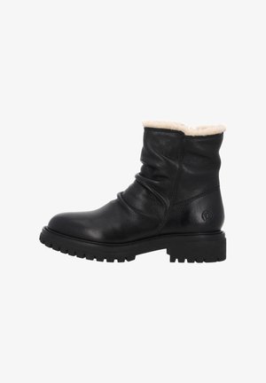 Stivaletti alla caviglia in pelle nera con foderatura soffice color crema, design morbido, punta arrotondata e suola in gomma nera robusta. Presentano un emblema con il marchio.