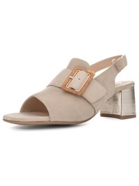 Beige suede open-toe slingback sandal with large rectangular buckle and metallic block heel, angled view on white background.