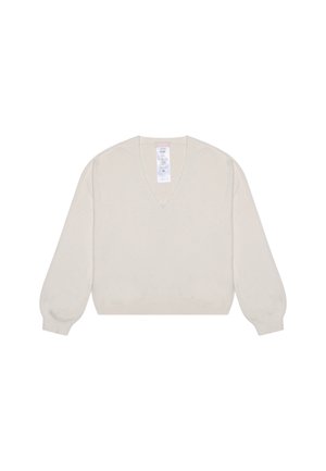 Jasno beżowy sweter z dzianiny z dekoltem w serek, długimi rękawami w stylu balonowym i subtelną fakturą w kropeczki. Zawiera metkę z instrukcją prania przy dekolcie.