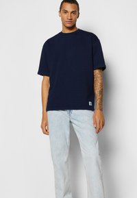 Lee WEST - Calças de ganga de corte relaxado - acid echo bay