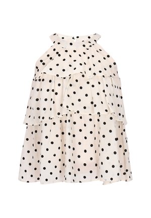 Weißes ärmelloses Top mit mehreren Lagen, das große schwarze Polka-Dots zeigt. Der Stoff scheint leicht und weich im Griff zu sein, mit einem runden Ausschnitt.