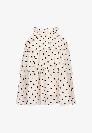 Weißes ärmelloses Top mit mehreren Lagen, das große schwarze Polka-Dots zeigt. Der Stoff scheint leicht und weich im Griff zu sein, mit einem runden Ausschnitt.