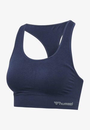 Reggiseno sportivo blu navale realizzato in un tessuto liscio e elastico con design a schiena scoperta, dotato di fascia sotto torace a costine e un logo discreto.